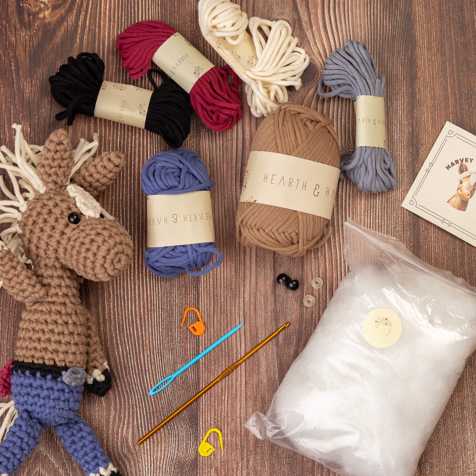 Complete crochet kit contents for Hearth & Harbor Farmhouse Crochet Kit – includes beginner-friendly yarn, crochet hook, safety eyes, pattern guide, and stuffing